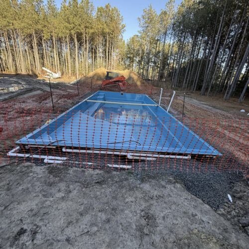 Fiberglass pool installation in Delaware by Coastal Outdoor Living