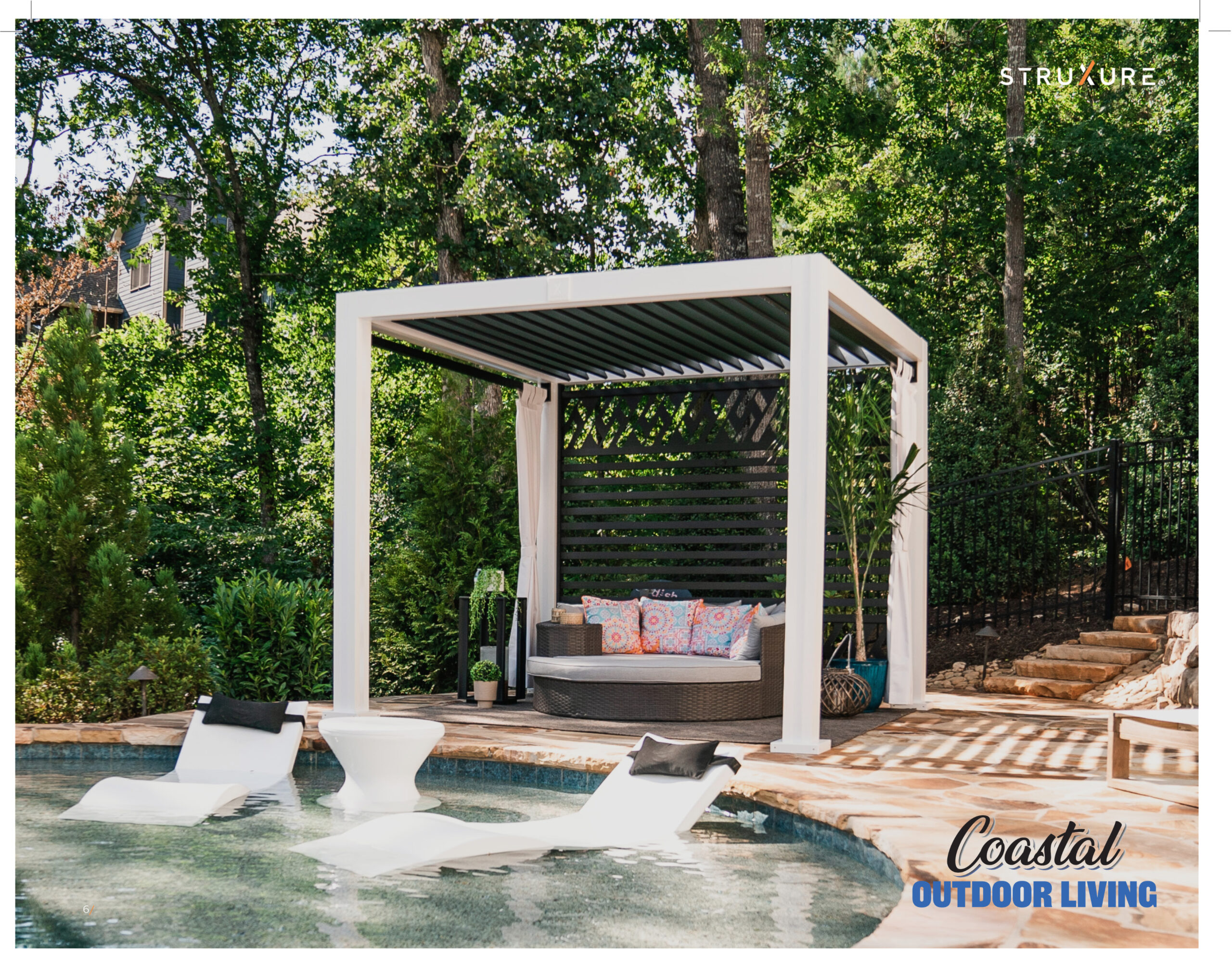 Modern white Cabana X poolside structure with comfortable outdoor seating and a coastal view in Delaware